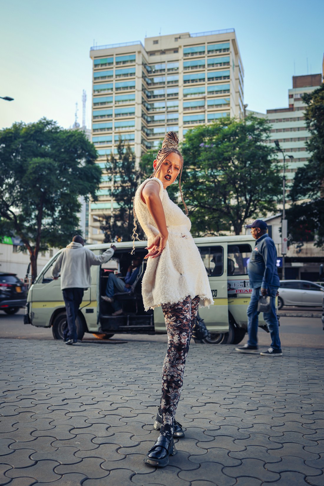 A woman standing on a city street